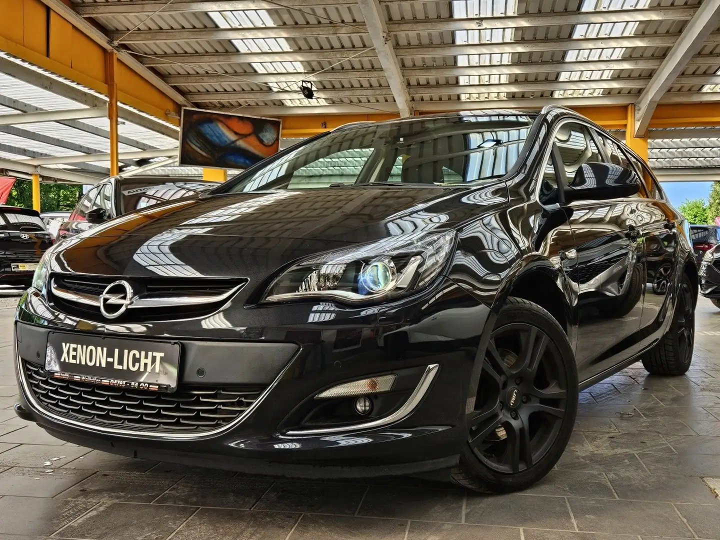 Opel Astra ST 2,0 CDTi 2.Hand mit Navi Xenon T.Leder Schwarz - 1