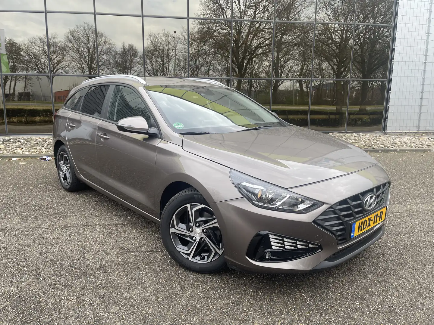 Hyundai i30 1.0 T-GDi MHEV ComSm Bruin - 1