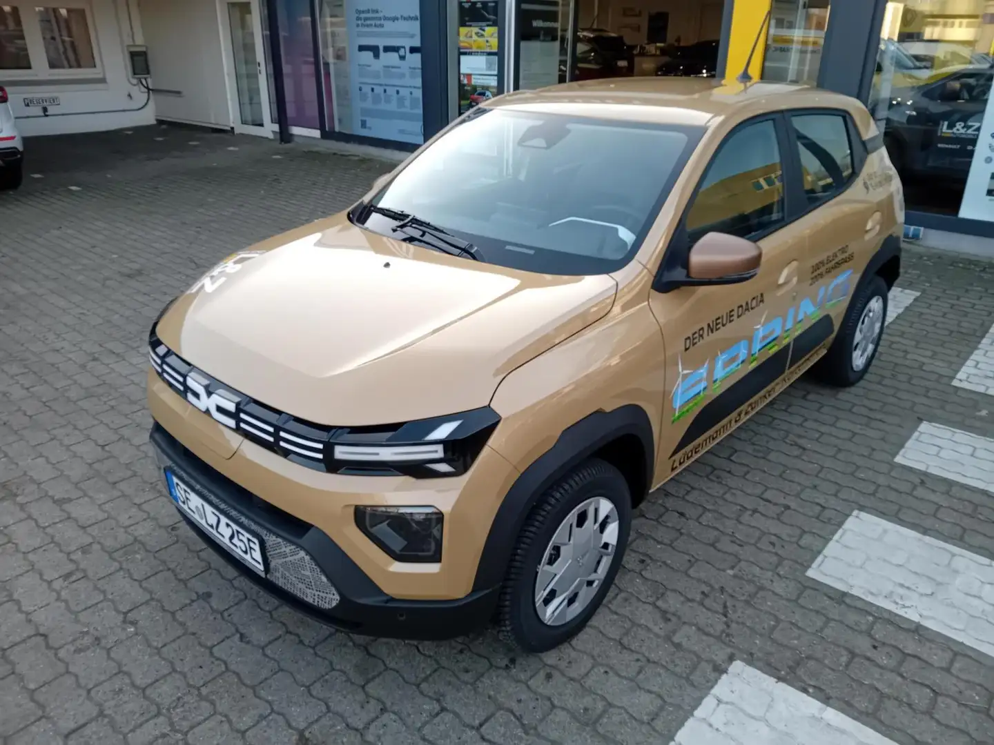 Dacia Spring Extreme ELECTRIC 65 Navi/PDC Klima,PDC Beige - 1