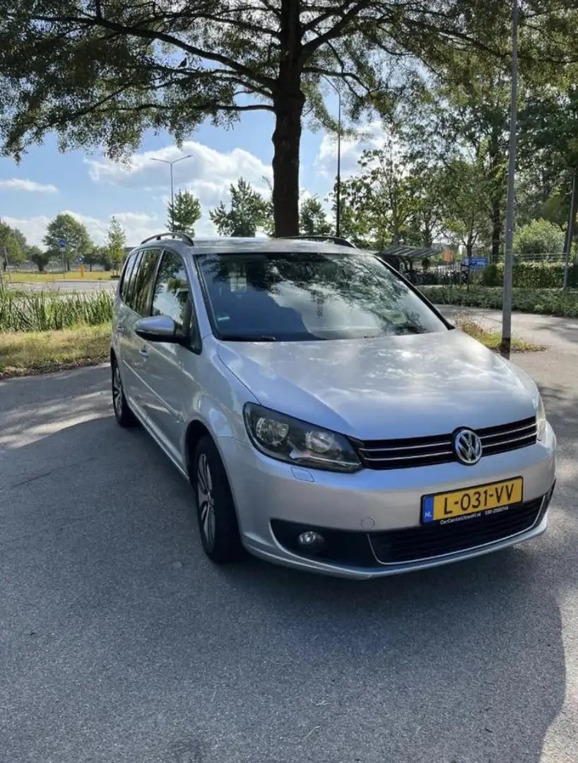 Volkswagen Touran 1.6 TDI Highl. BlueM Grijs - 1