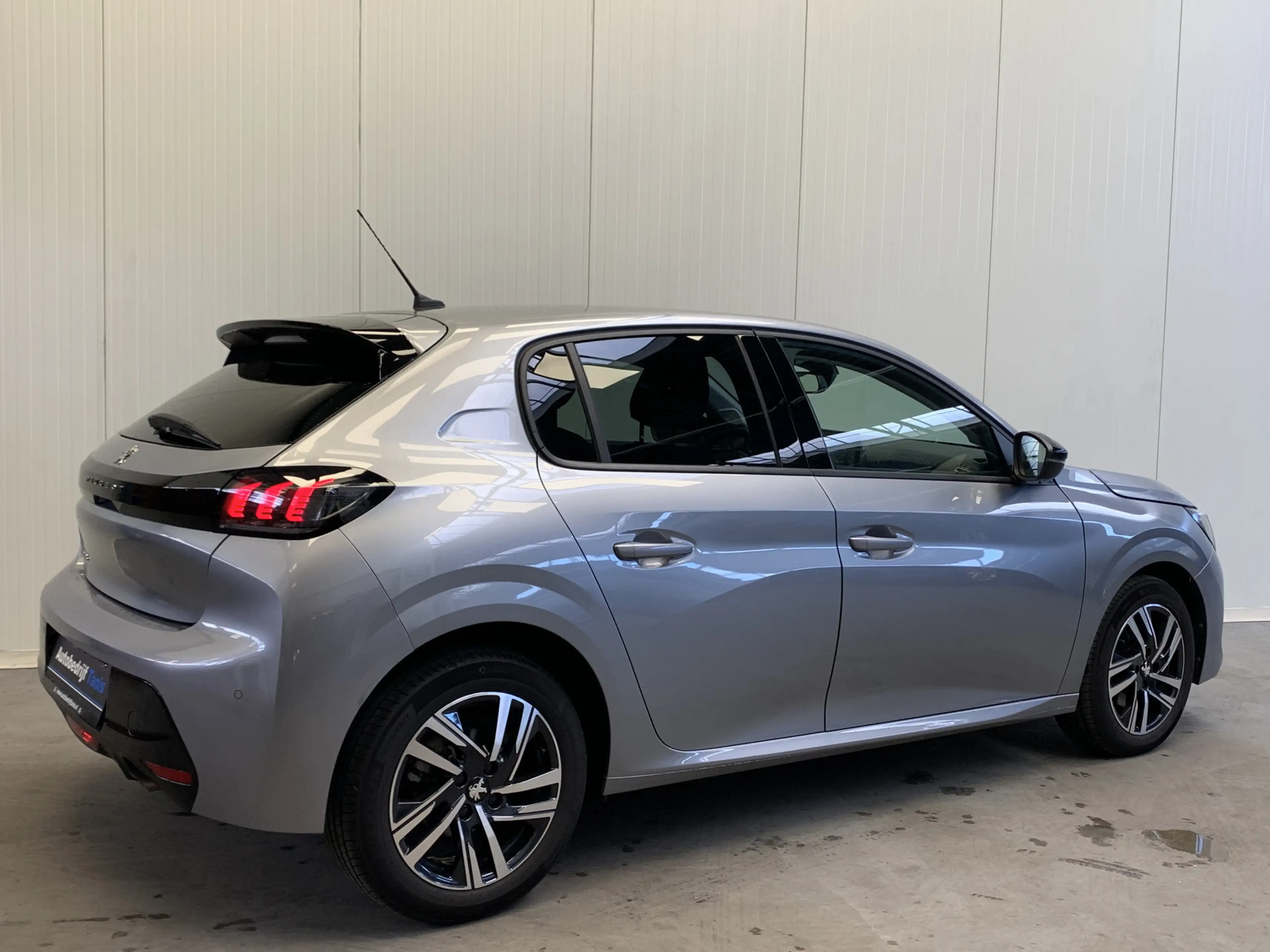 Peugeot 208 1.2 PureTech Allure 100PK LEDER-CAMERA-NAVI by CAR — photo 2
