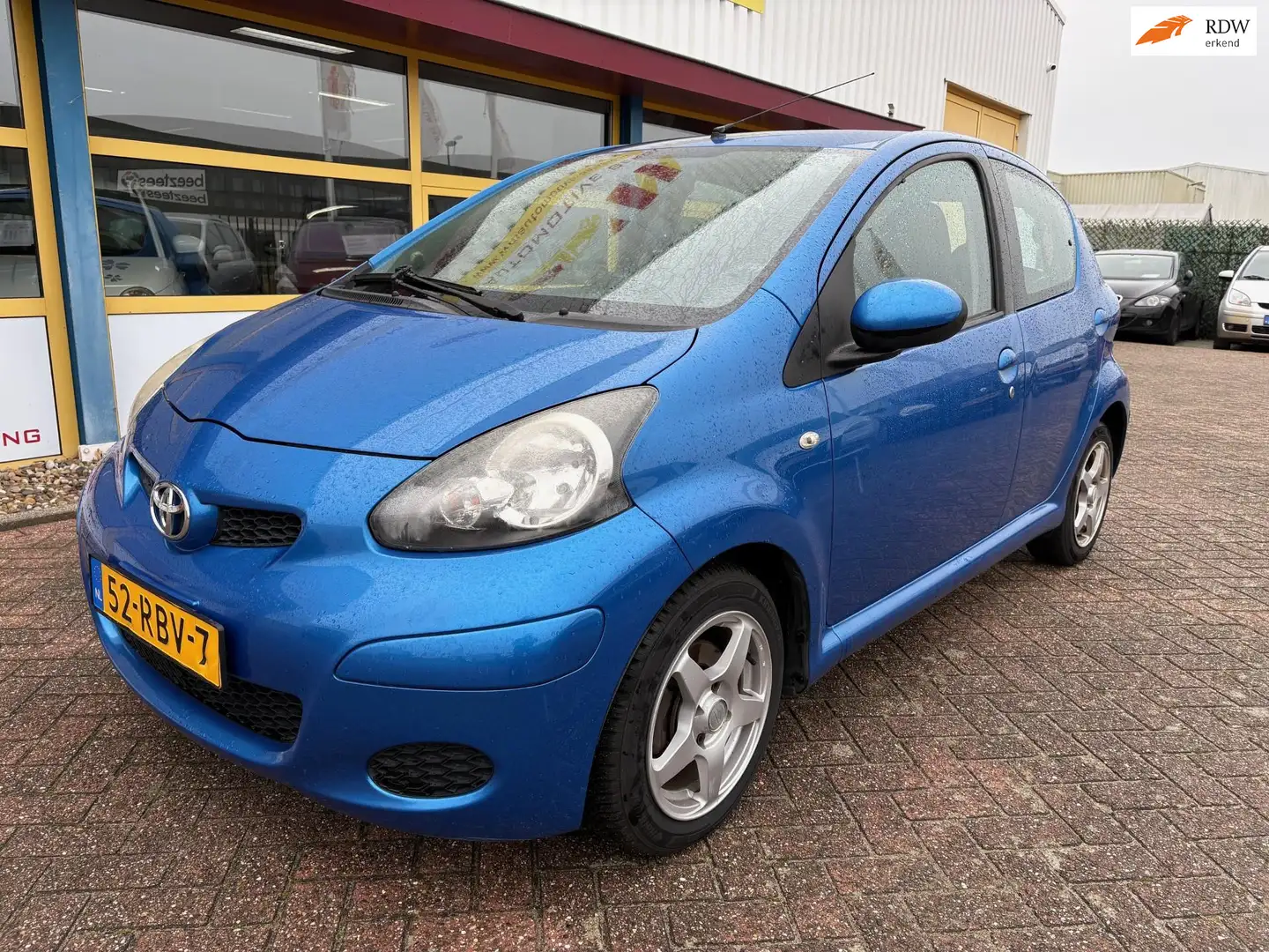 Toyota Aygo 1.0-12V Comfort Navigator APK T/M 3-5-2026 Blauw - 1