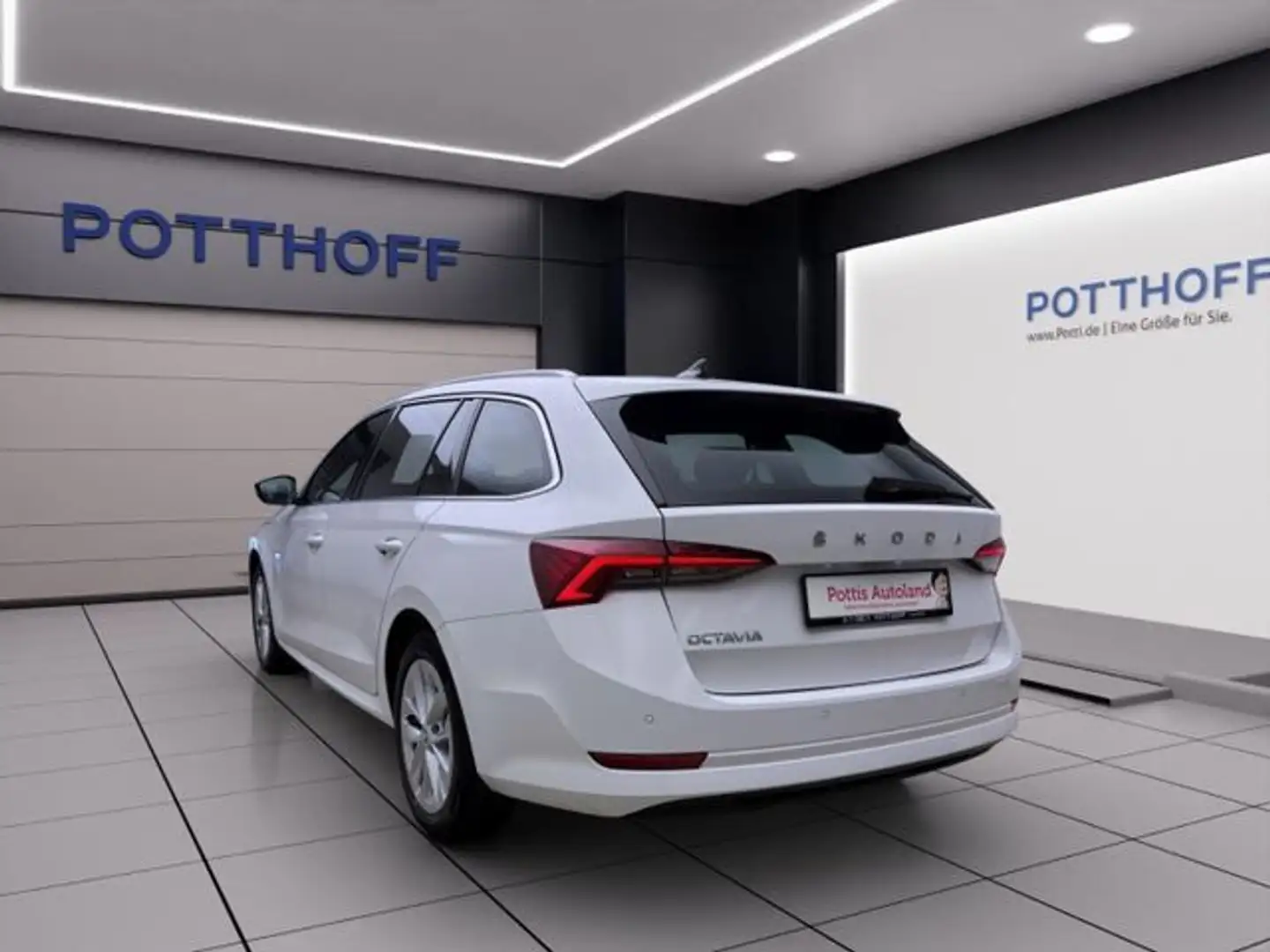 Skoda Octavia Combi 2.0 TDI DSG STYLE NAVI PDC SITZHZG Weiß - 2