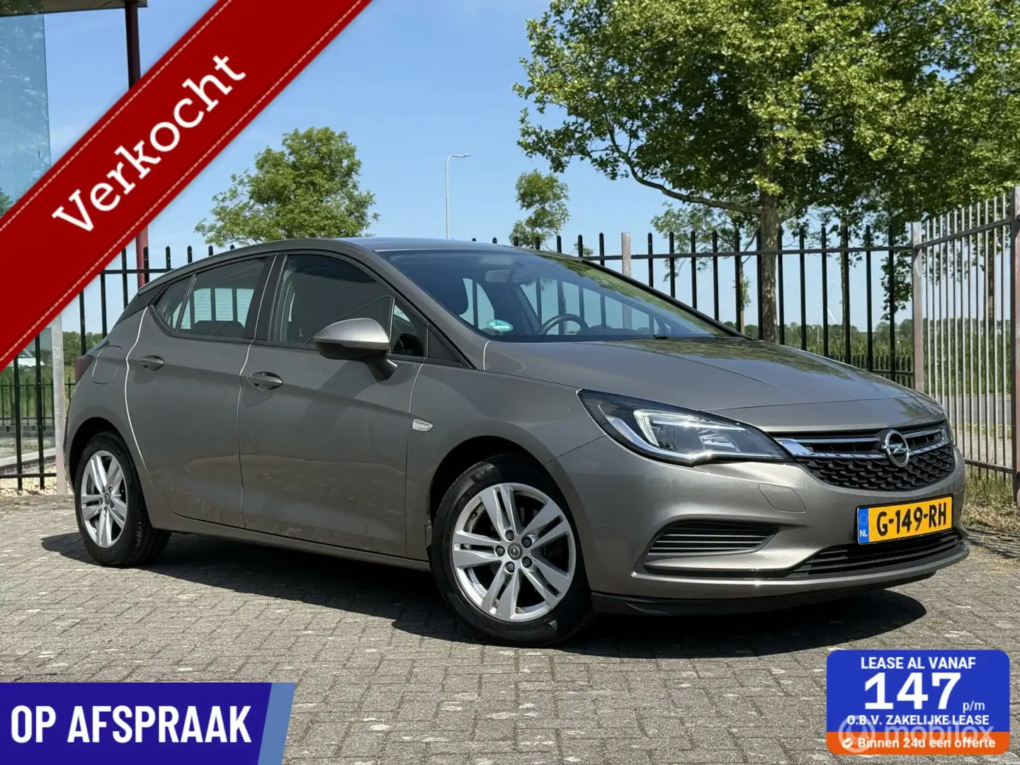 Opel Astra 1.0 Online Edition | Carplay | Airco | Rijklaar Bruin - 1