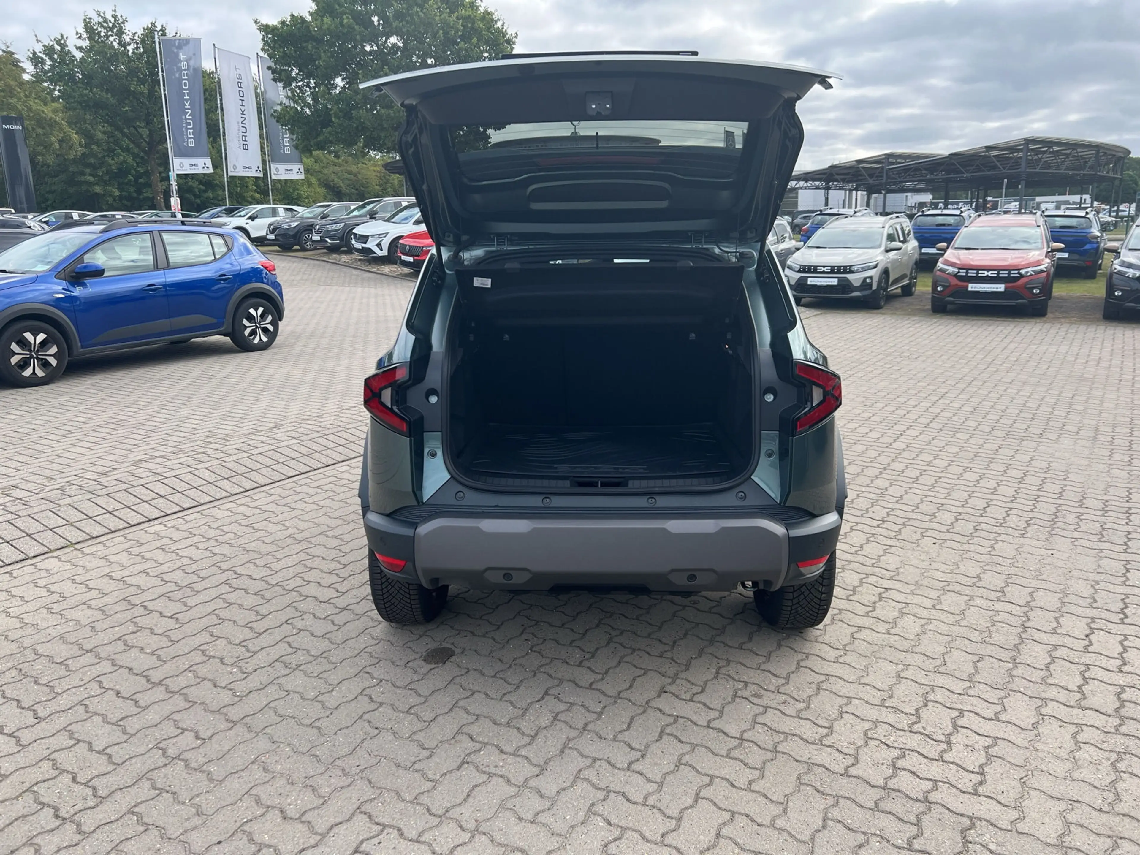Dacia Duster hybrid-G 150 EDC 4x4 Extreme SHZ+RFK+GJR — photo 15