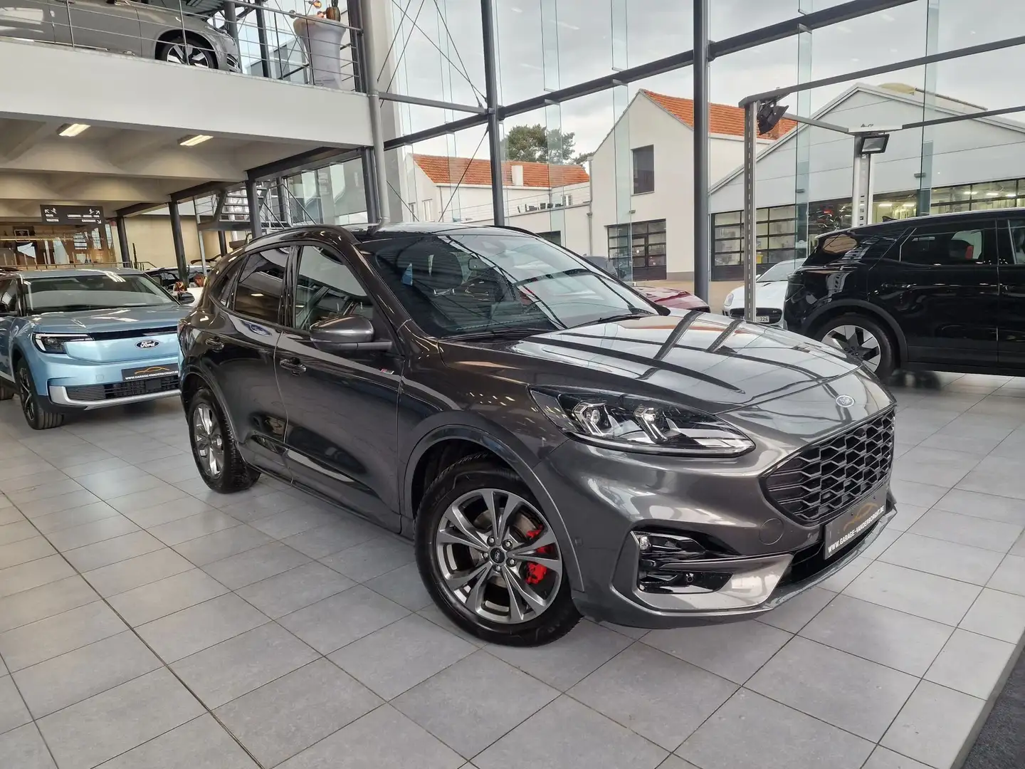 Ford Kuga ST-LINE X BENZINE 3 JAAR WAARBORG+TAL VAN OPTIES Grigio - 1