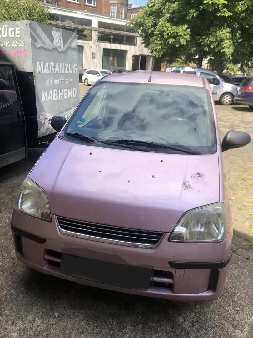 Daihatsu Cuore Cuore 1.0 Top - 2