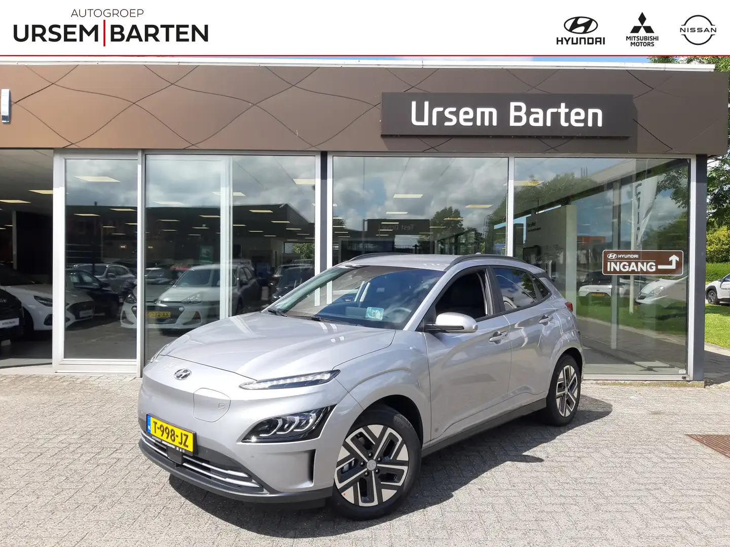 Hyundai KONA EV Business 64 kWh | Navigatie | HUD | stoelverwar Grijs - 1