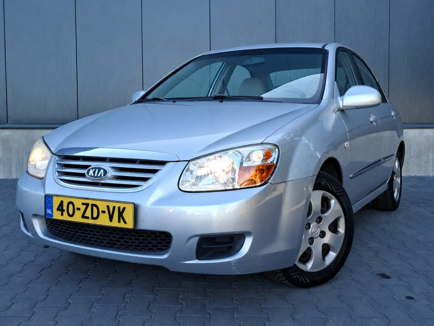 Kia Cerato 1.6 CVVT X-tra | Airco | Trekhaak | 5 deurs | Onde Grau - 1