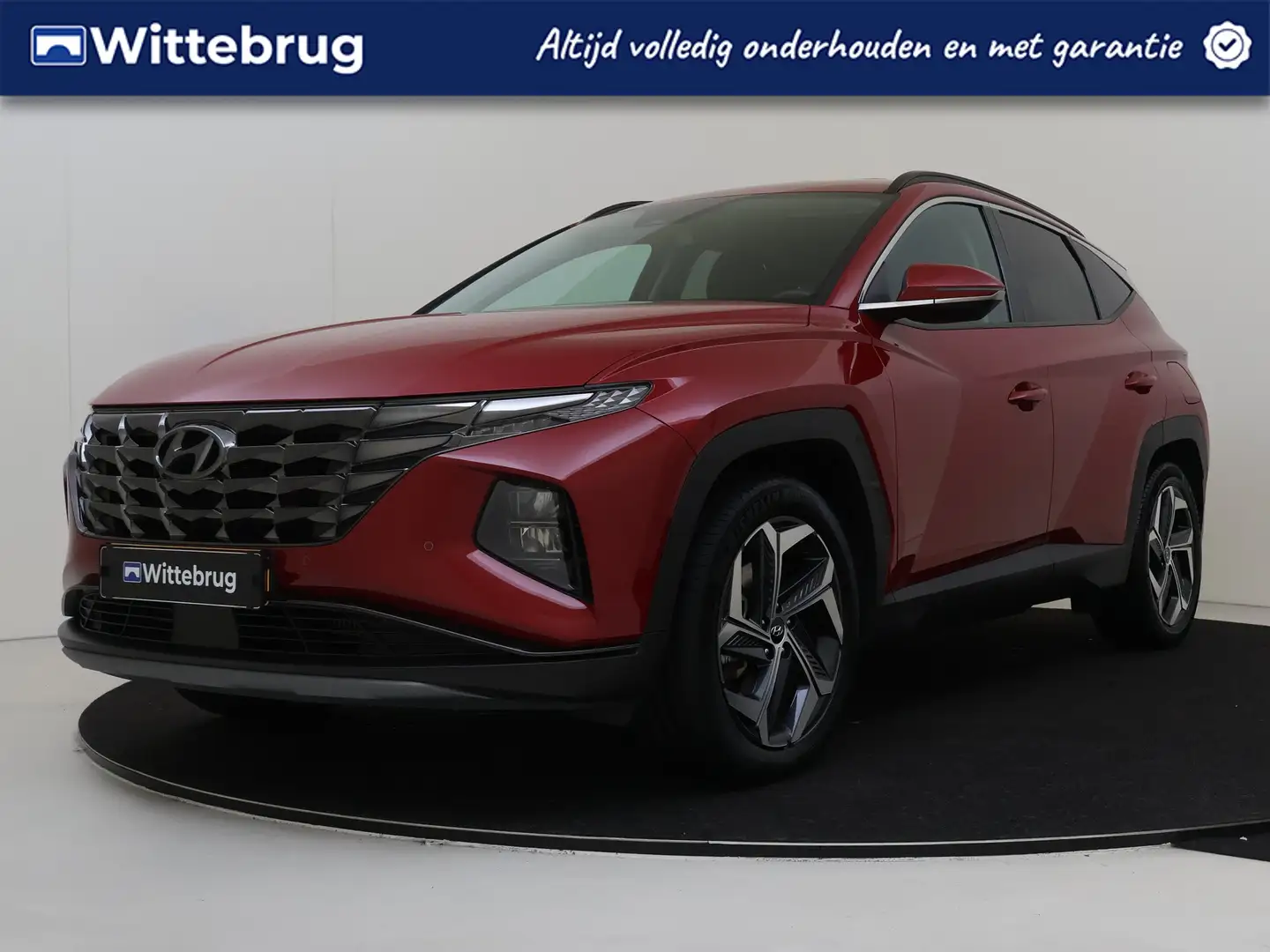 Hyundai TUCSON 1.6 T-GDI PHEV Comfort Smart 4WD | Navigatie | Par Rood - 1