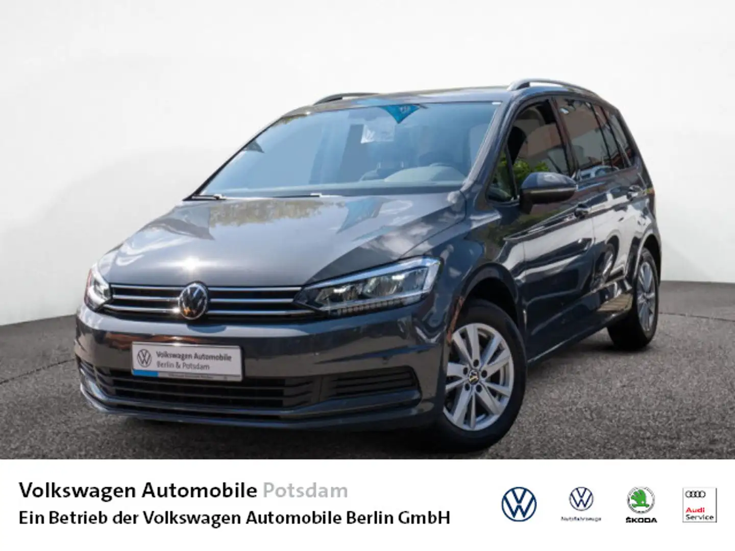 Volkswagen Touran 1.5 TSI Comfortline DSG Navi Standh. LED Grijs - 1