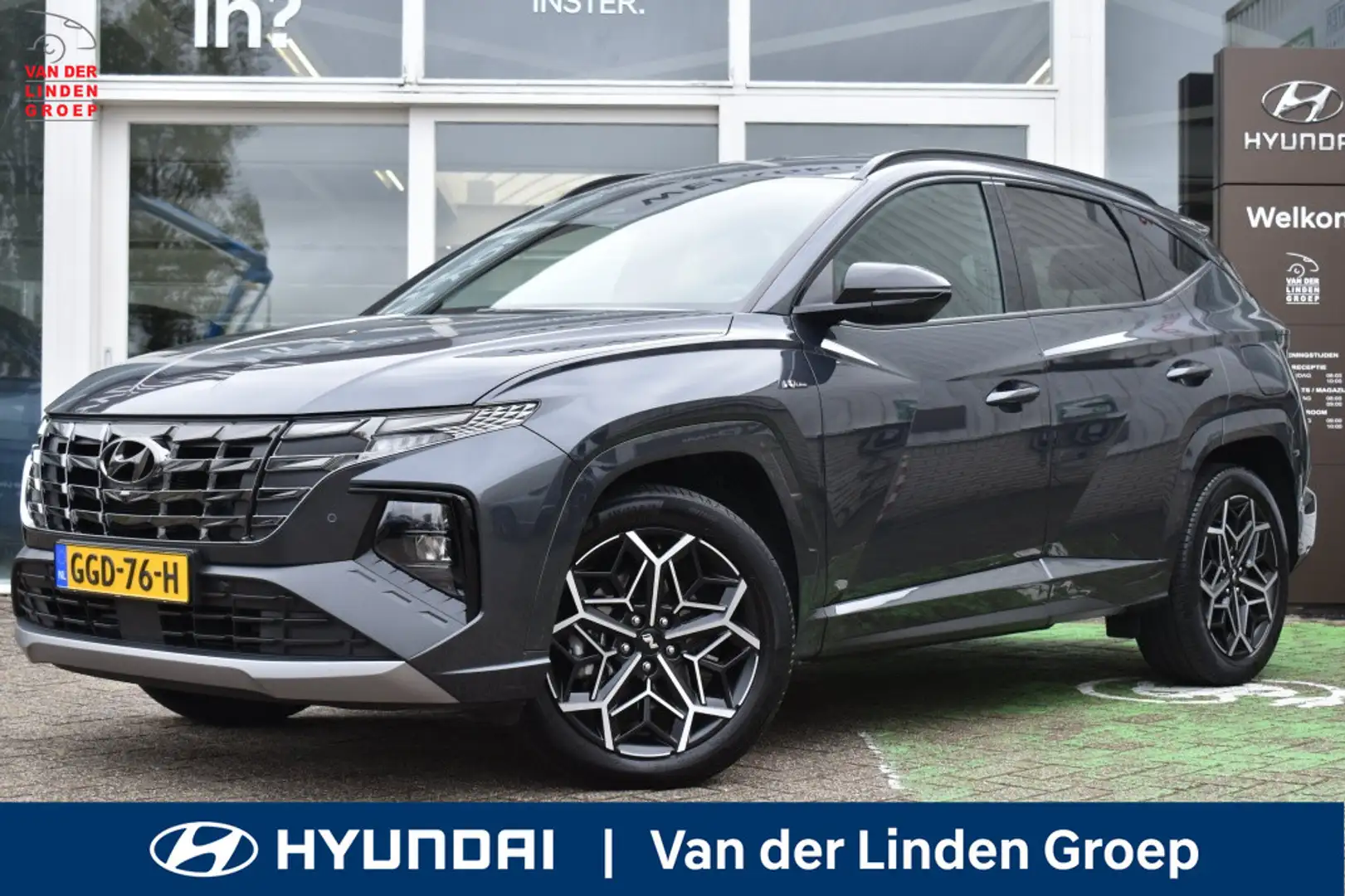 Hyundai TUCSON 1.6 T-GDI HEV N-Line 230PK! Navi/360view/Trekhaak Grijs - 1