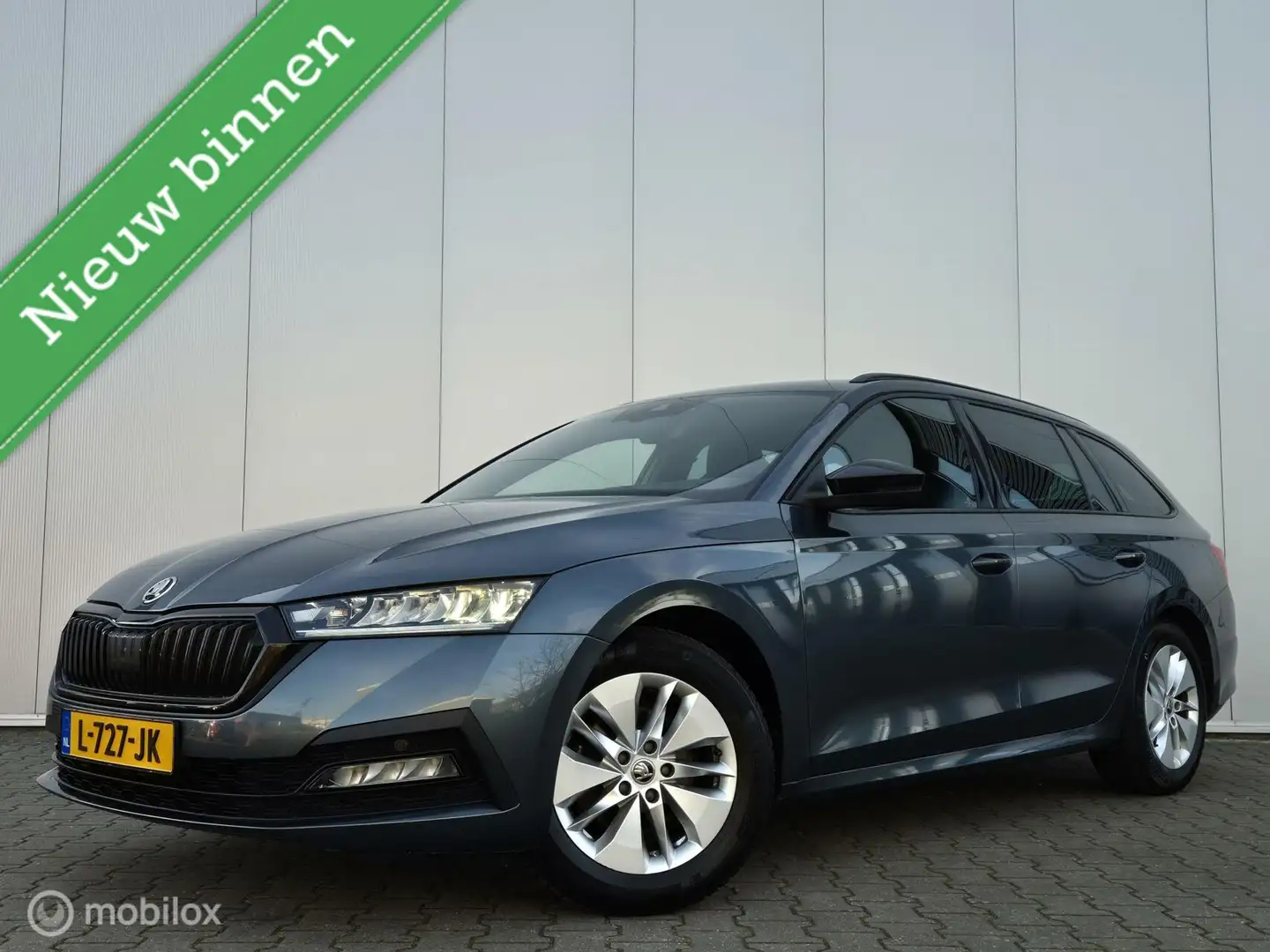 Skoda Octavia Combi 1.0 TSI SPORT/FULL LED/TREKHAAK/KEYLESS/VIRT Grijs - 1