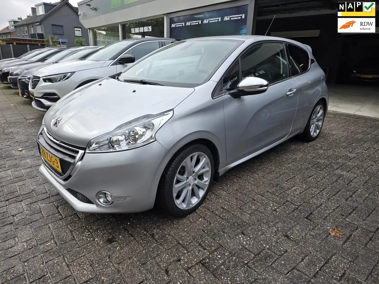 Peugeot 208 1.6 THP Allure | 2E EIGENAAR | 12MND GARANTIE | LE Grijs - 1