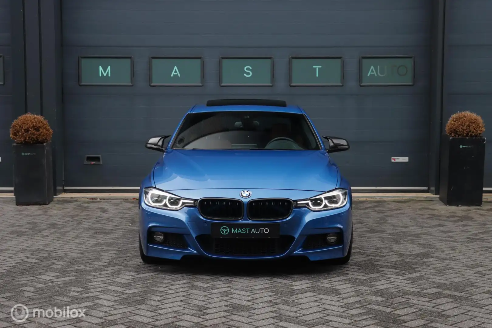 BMW 340 3-serie 340i xDrive M-Sport|Pano|NaviPro|Remus|HUD Blauw - 2
