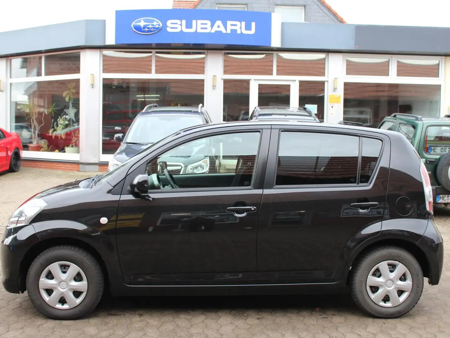 Subaru Justy Trend inkl. Winterräder Noir - 1