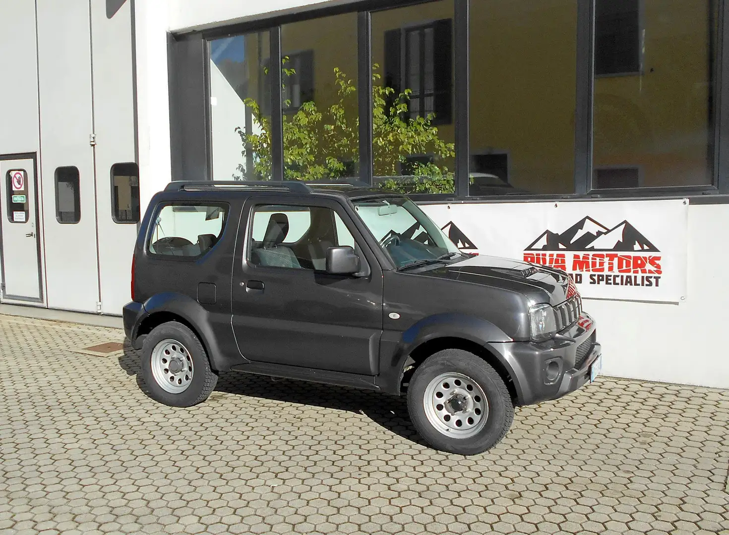 Suzuki Jimny 1.3 vvt Evolution 4wd E6 - NEOPATENTATO Grigio - 2
