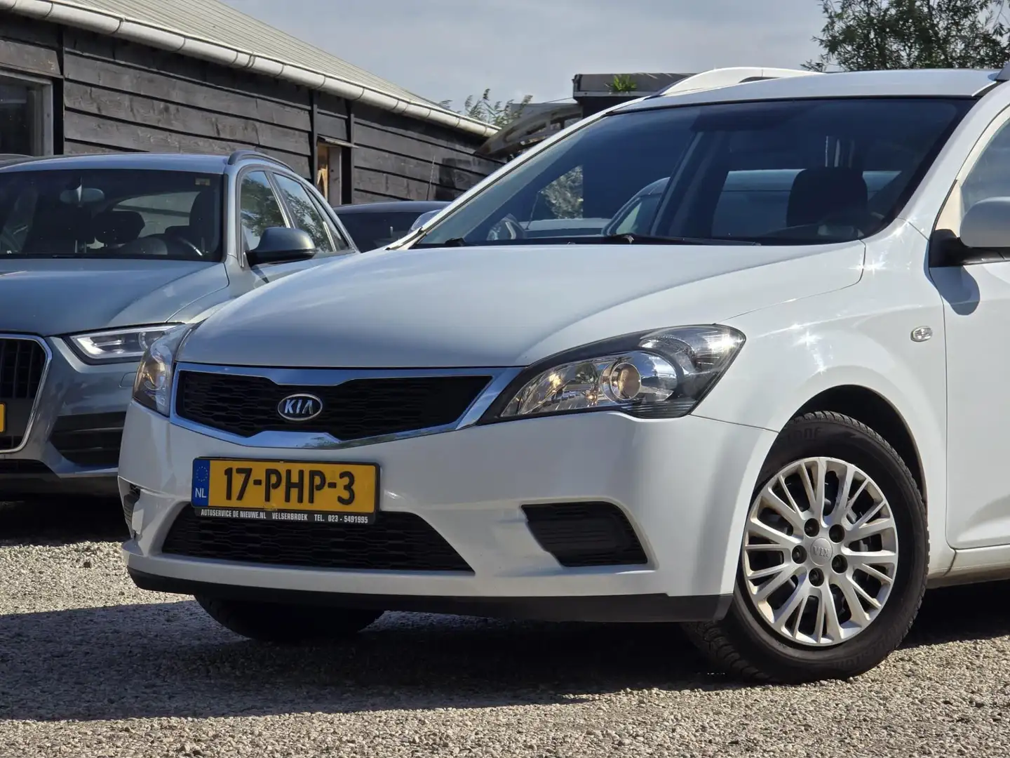 Kia Ceed / cee'd Sporty Wagon 1.4 CVVT X-tra Airco/PDC/Bluetooth Wit - 2