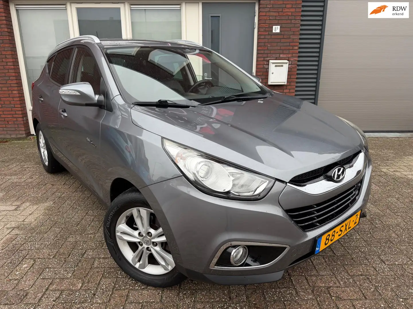 Hyundai iX35 1.6i GDI Business Edition / Leder / Camera / Navi Grijs - 1