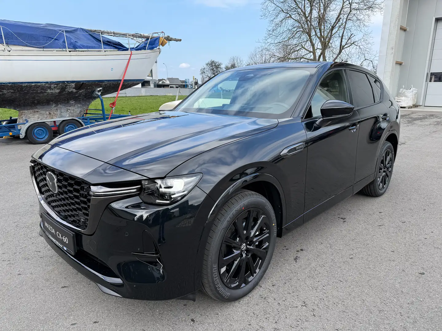 Mazda CX-60 2.5L e-SKYACTIV PHEV AWD HOMURA PLUS Aut. Schwarz - 1