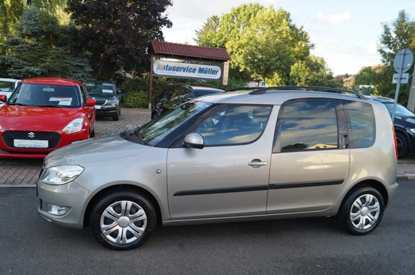 Skoda Roomster 77kw Standh.-Klimatr.-PDC-Sitz-49082 km Bronze - 2