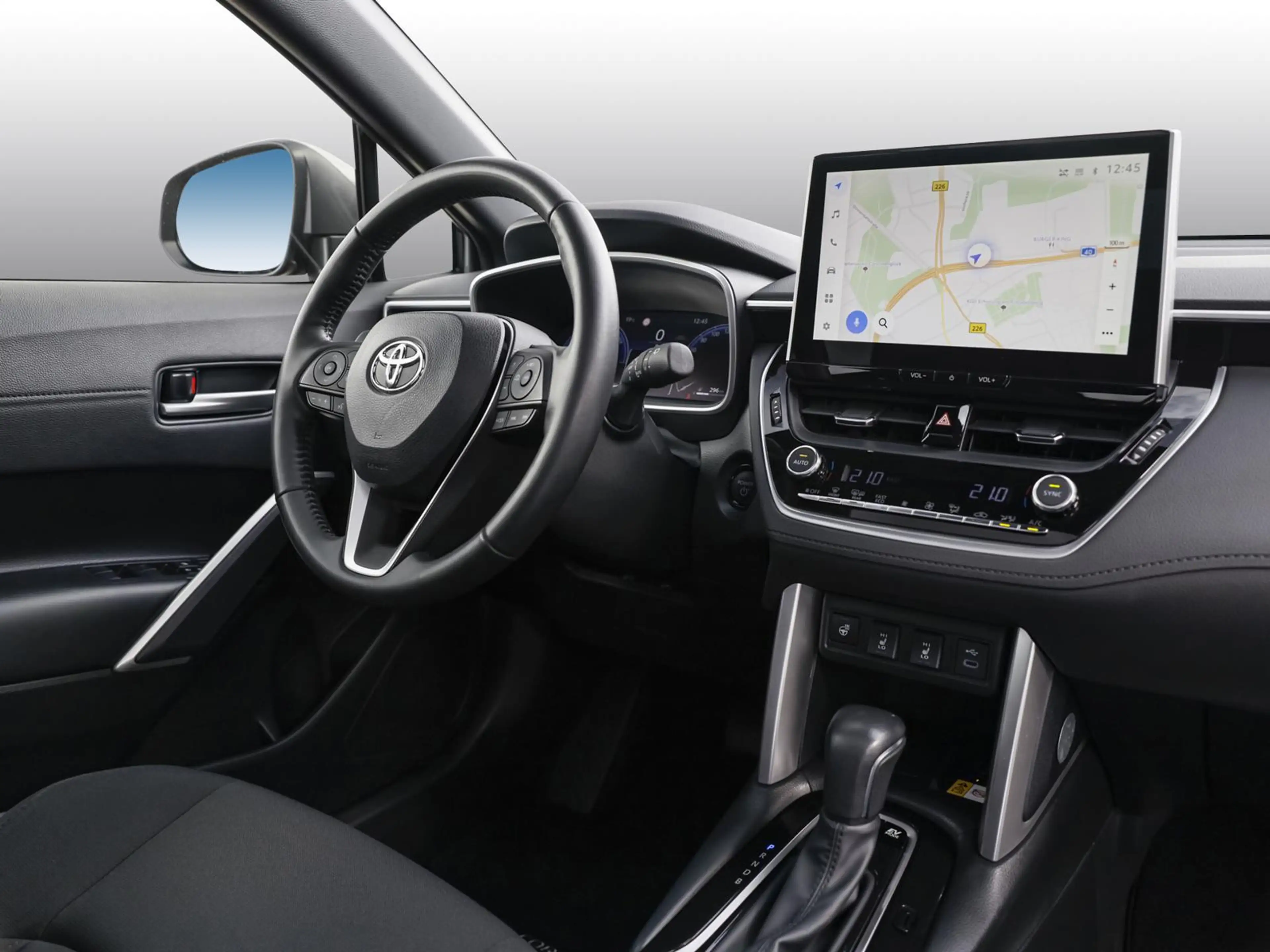 Toyota Corolla Cross Hybrid 4WD Team Deutschland SHZ PANO — photo 5