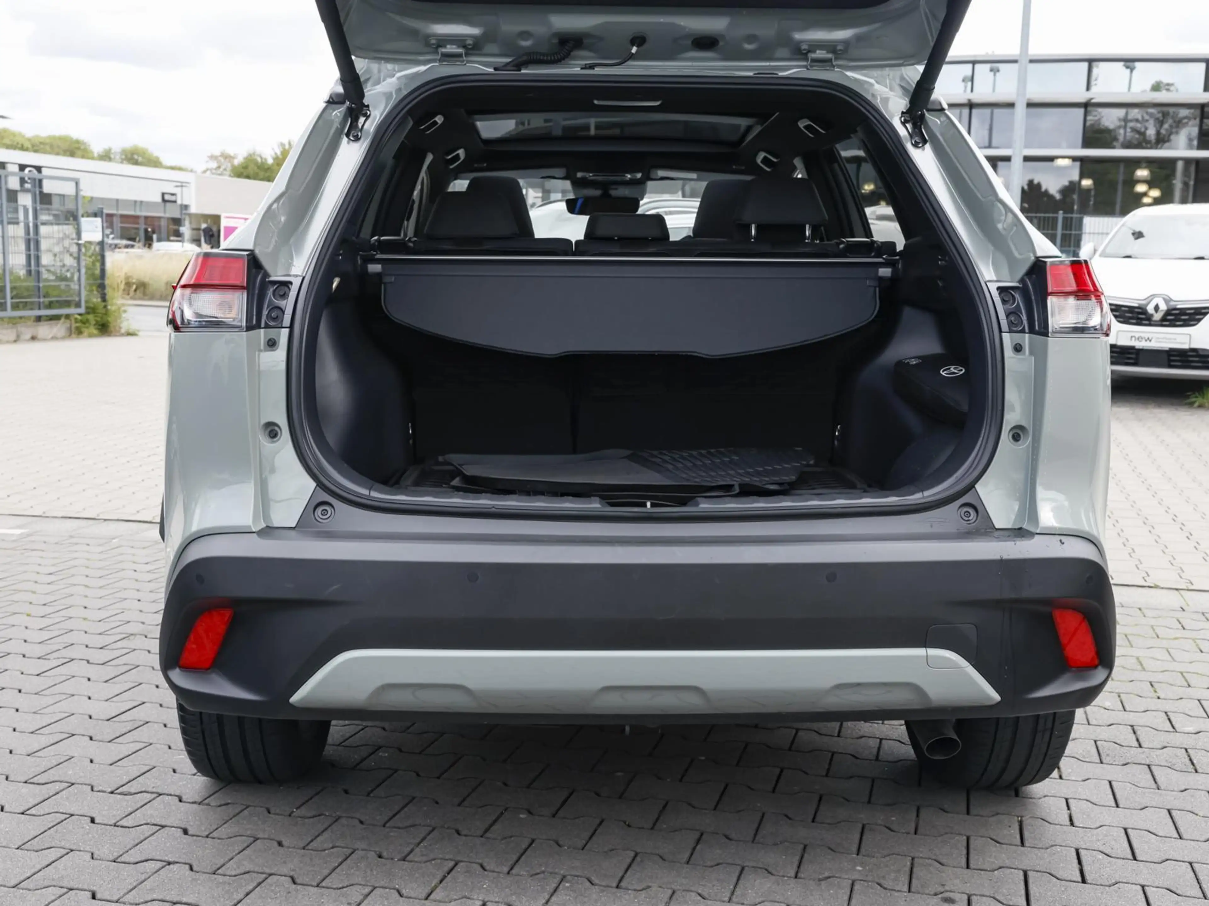 Toyota Corolla Cross Hybrid 4WD Team Deutschland SHZ PANO — photo 8