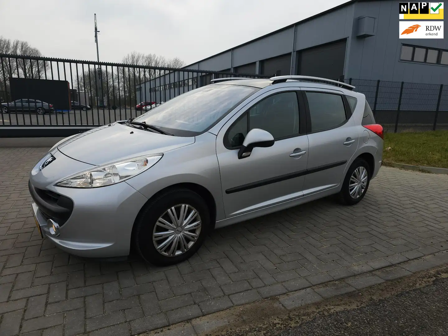 Peugeot 207 SW 1.6 VTi XS / Airco /Trekhaak / Apk 2-2026 / Pan Grijs - 1