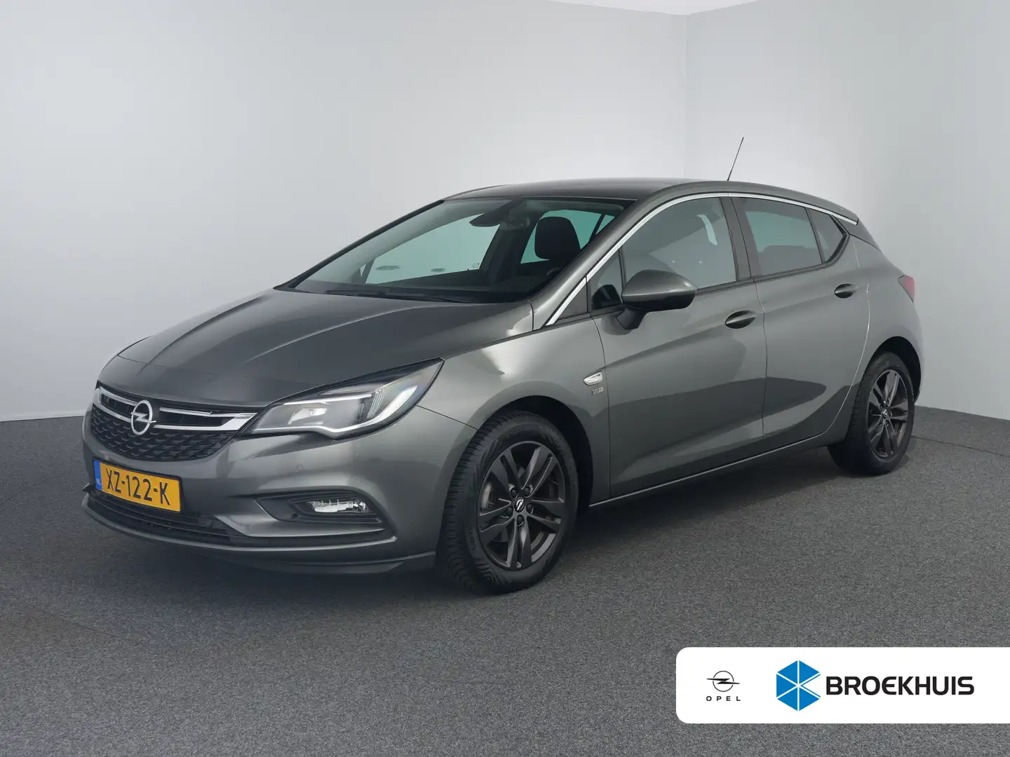 Opel Astra 1.0 Turbo 120 jaar EDITION | 105 PK AIRCO | NAVI | Grigio - 1