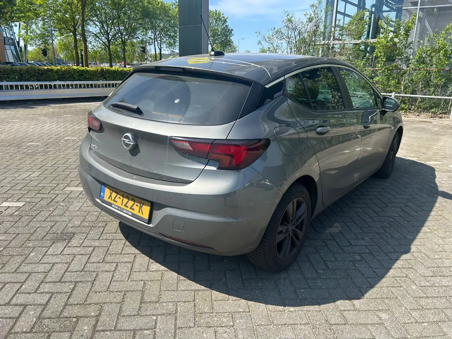 Opel Astra 1.0 Turbo 120 jaar EDITION | 105 PK AIRCO | NAVI | Gris - 2