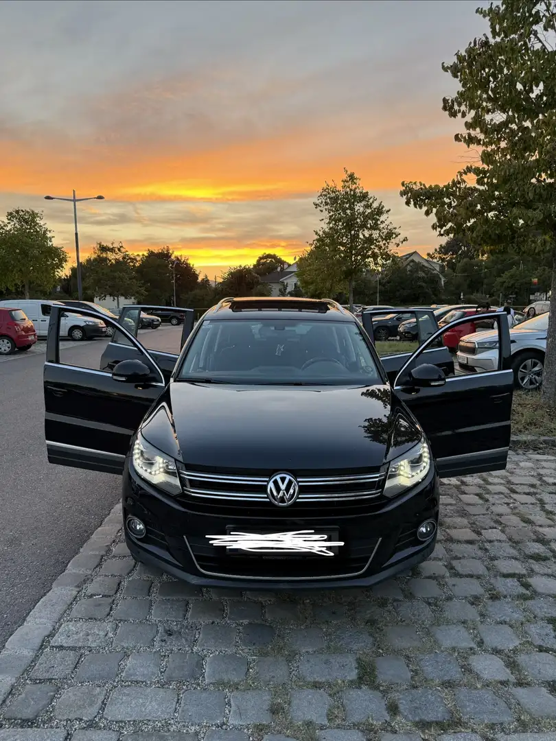 Volkswagen Tiguan 2,0 TDI 4Motion Sky DPF Aut. - 1