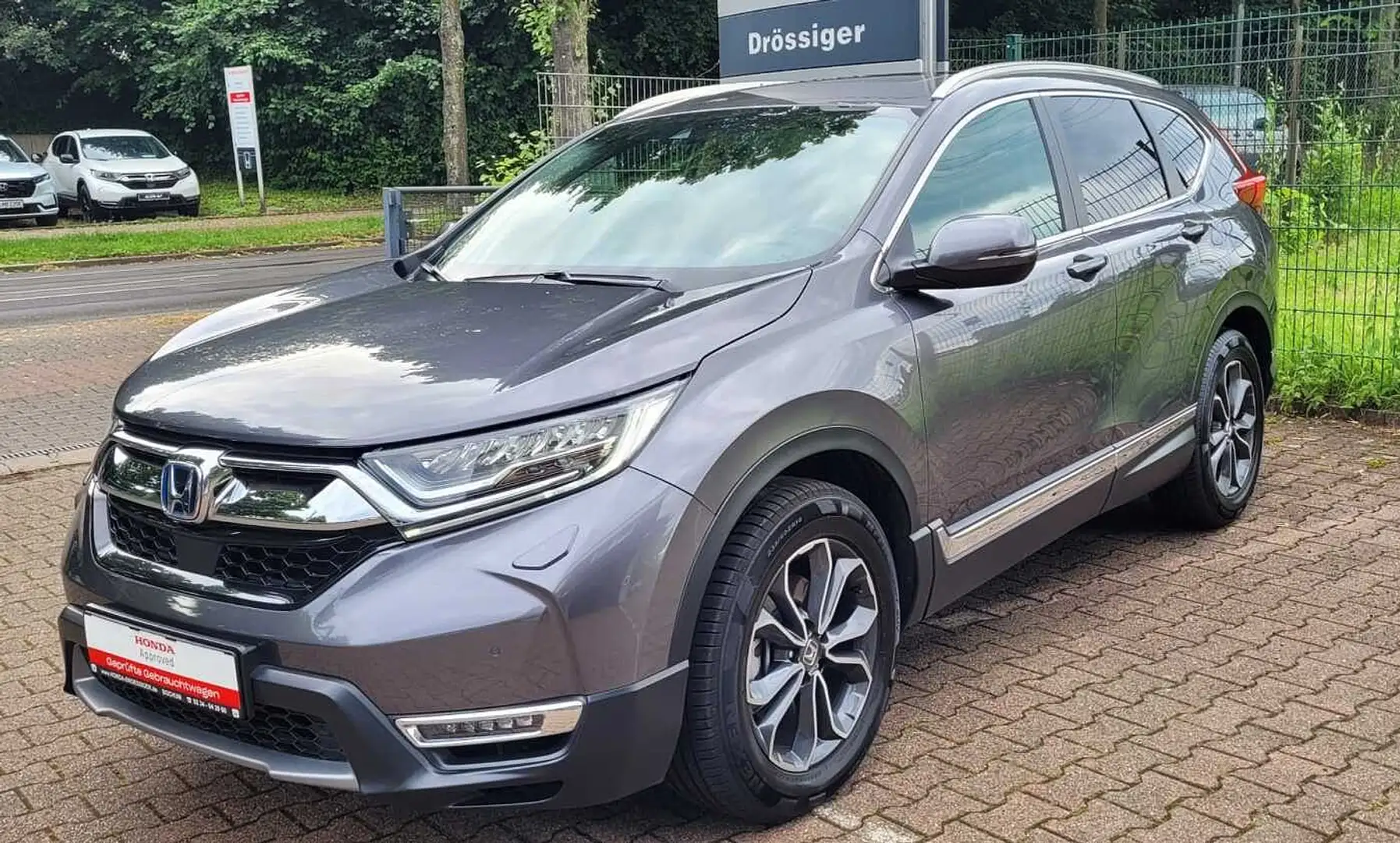 Honda CR-V Hybrid 2.0 i-MMD 4WD Executive Grau - 1