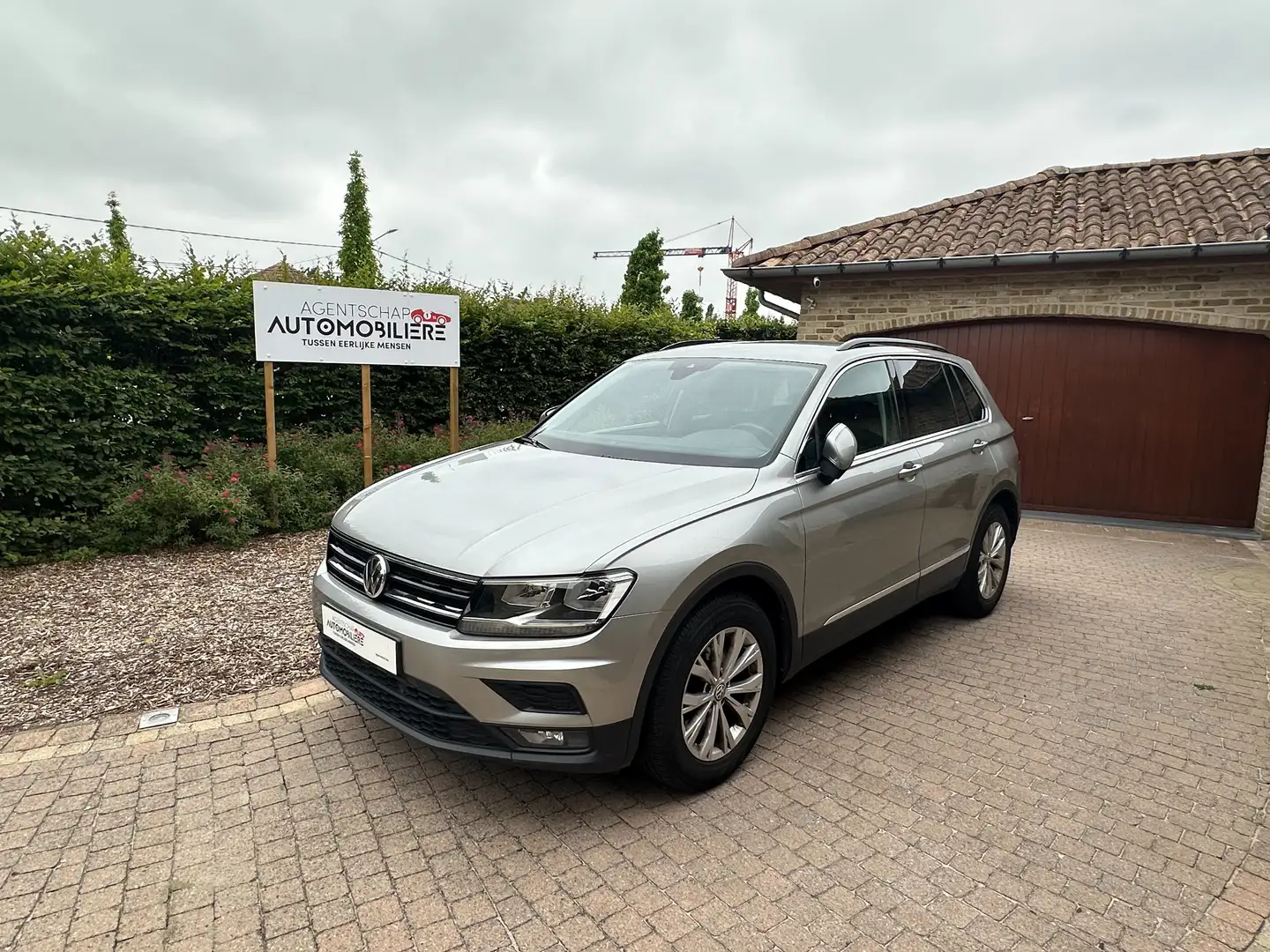 Volkswagen Tiguan 1.5 TSI ACT Met 1 jaar garantie kan tot 5 jaar Brons - 1