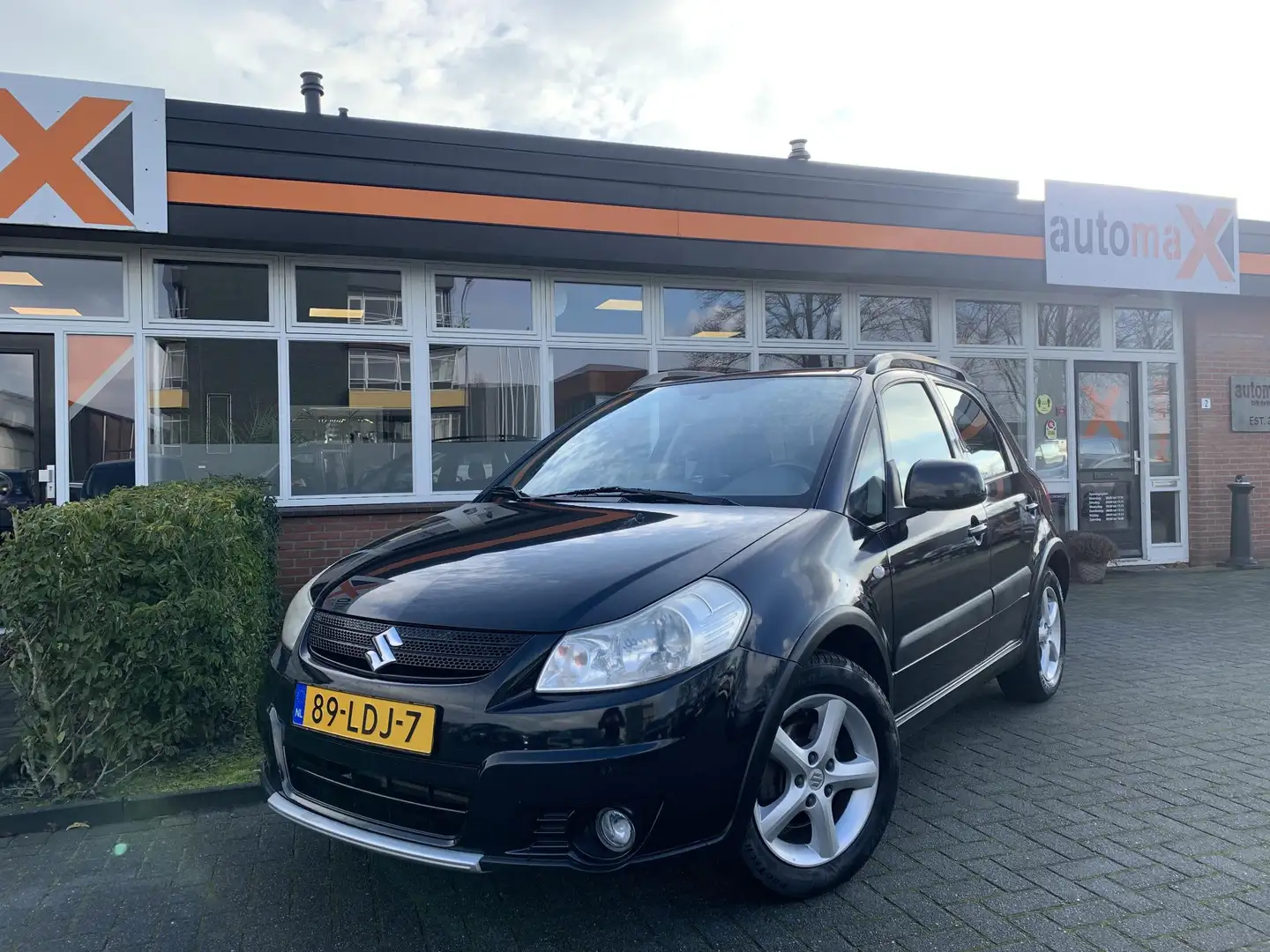 Suzuki SX4 1.6 Comfort |Airco!|Trekhaak!|Goed Onderhouden!| Noir - 1