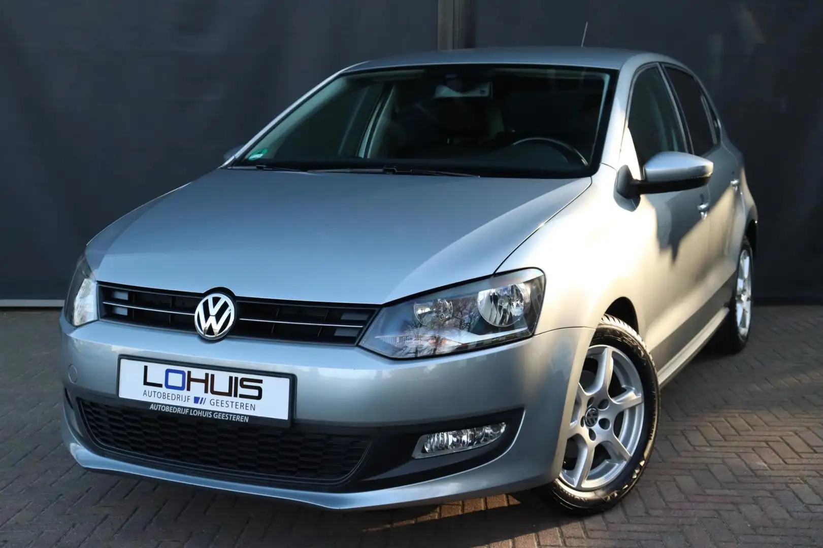 Volkswagen Polo 1.2-12V Comfortline TEAM CruiseControl|Scherm|Stoe Plateado - 1