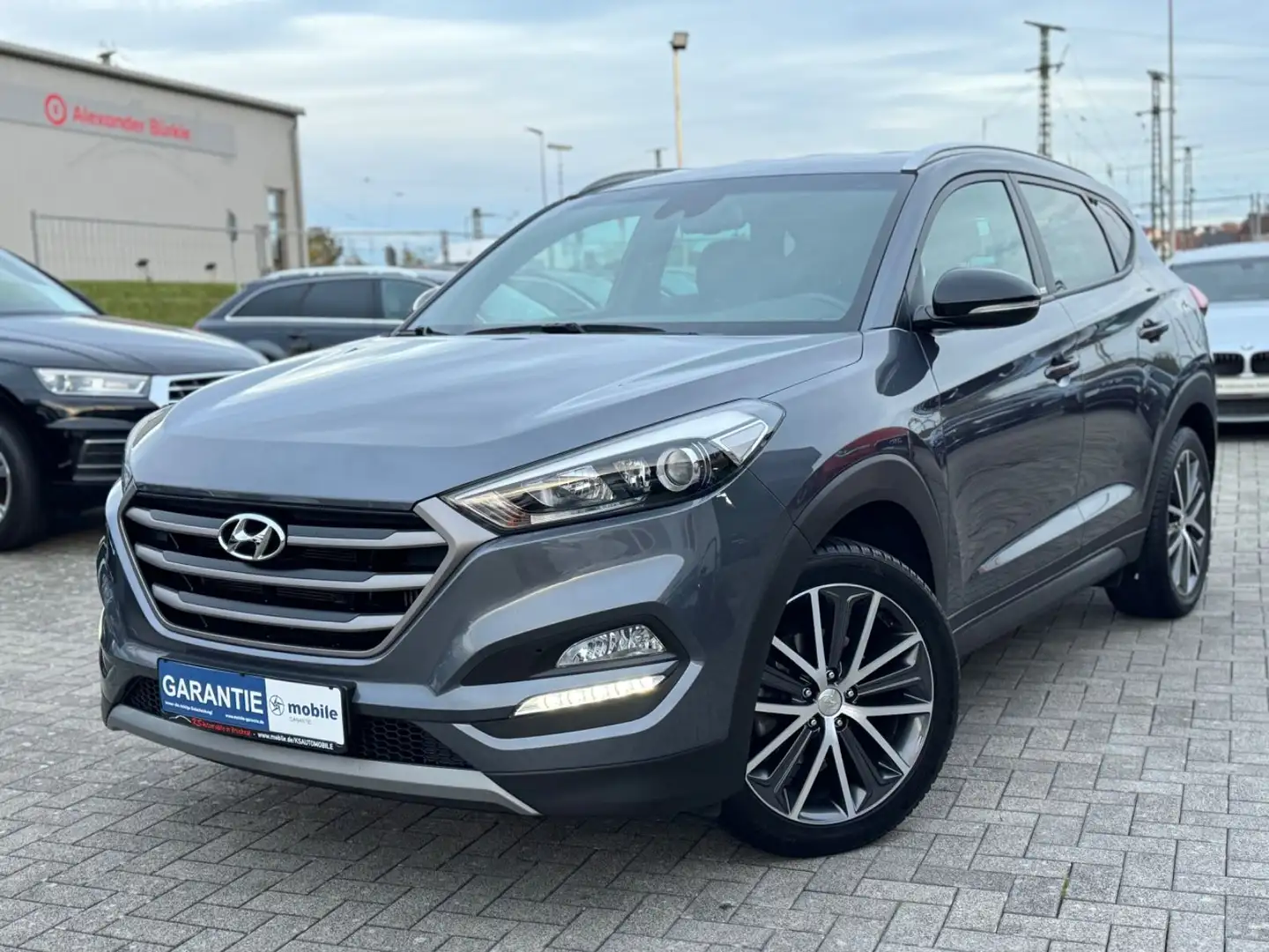 Hyundai TUCSON blue Passion *Navi*Kamera*Assist*1.Hand* Grau - 1