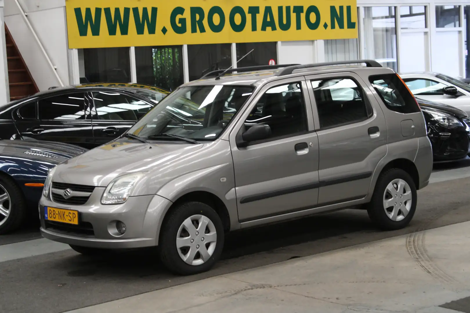 Suzuki Ignis 1.3-16V GLS Airco, Stuurbekrachtiging, 5 Deurs Gris - 1