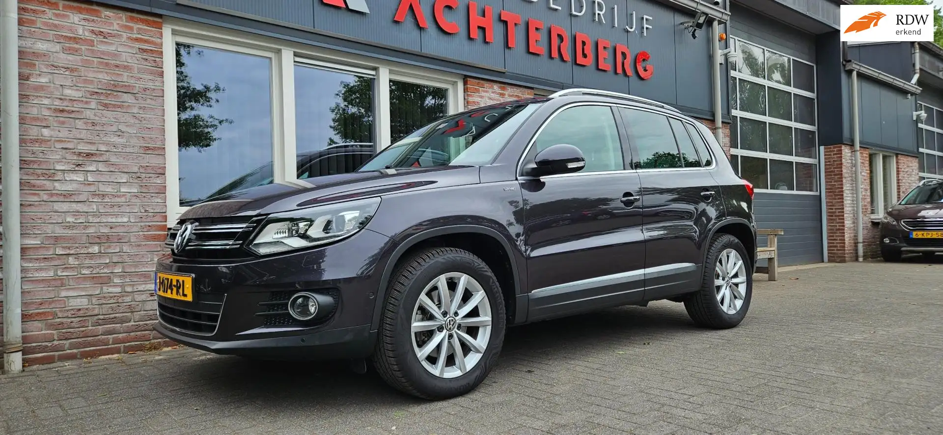 Volkswagen Tiguan 1.4 TSI Sport&Style Trekhaak! Xenon! Mooie/Nette A Grau - 1