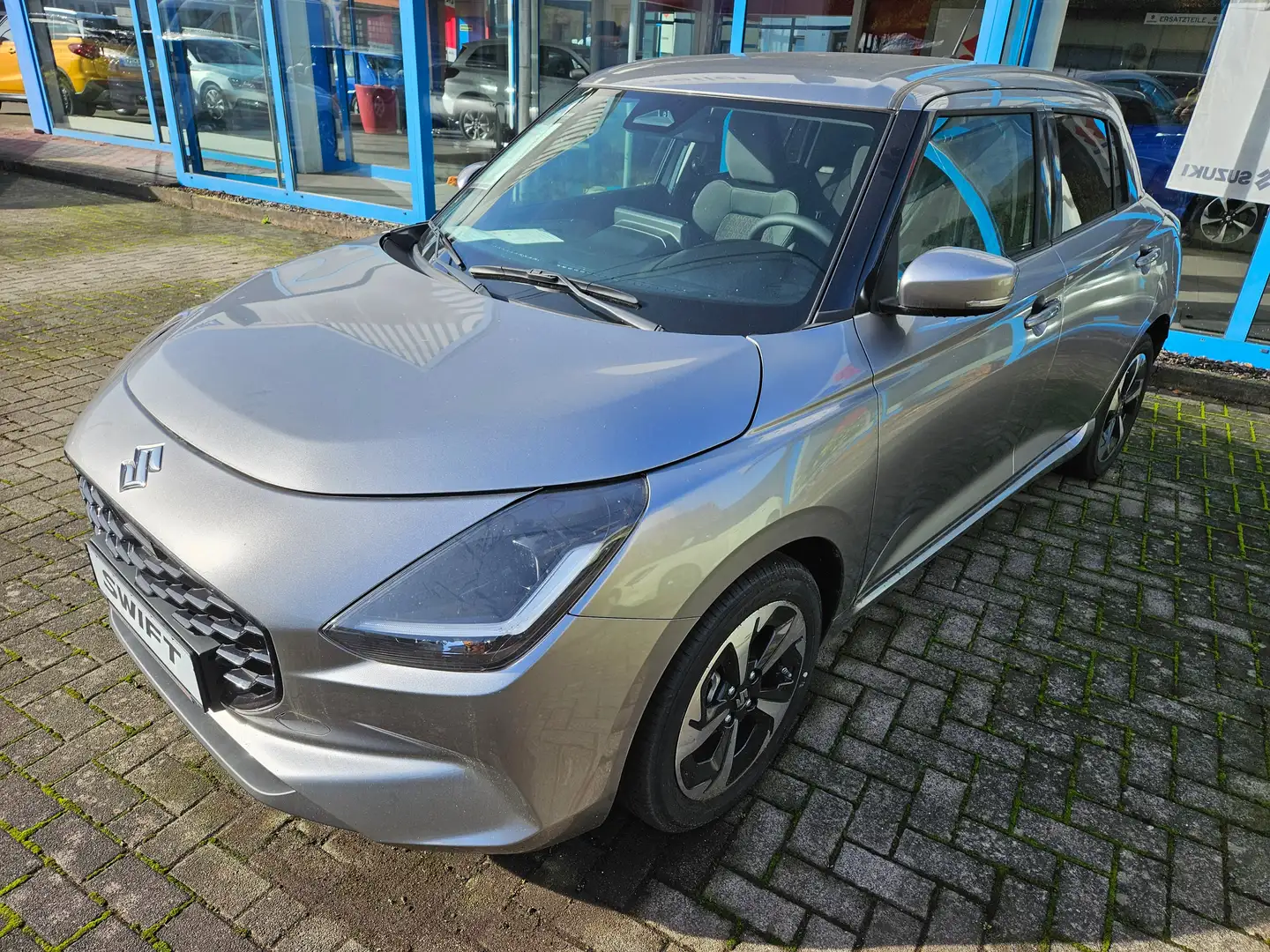 Suzuki Swift Swift 1.2 Comfort+ Dualjet Hybrid MT Silber - 1