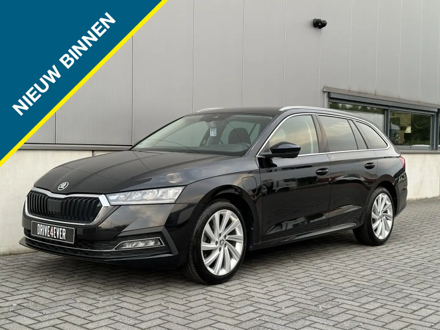 Skoda Octavia Combi 1.4 TSI iV Sport Bns NAVI PDC ECC SPORTVELGE Zwart - 1