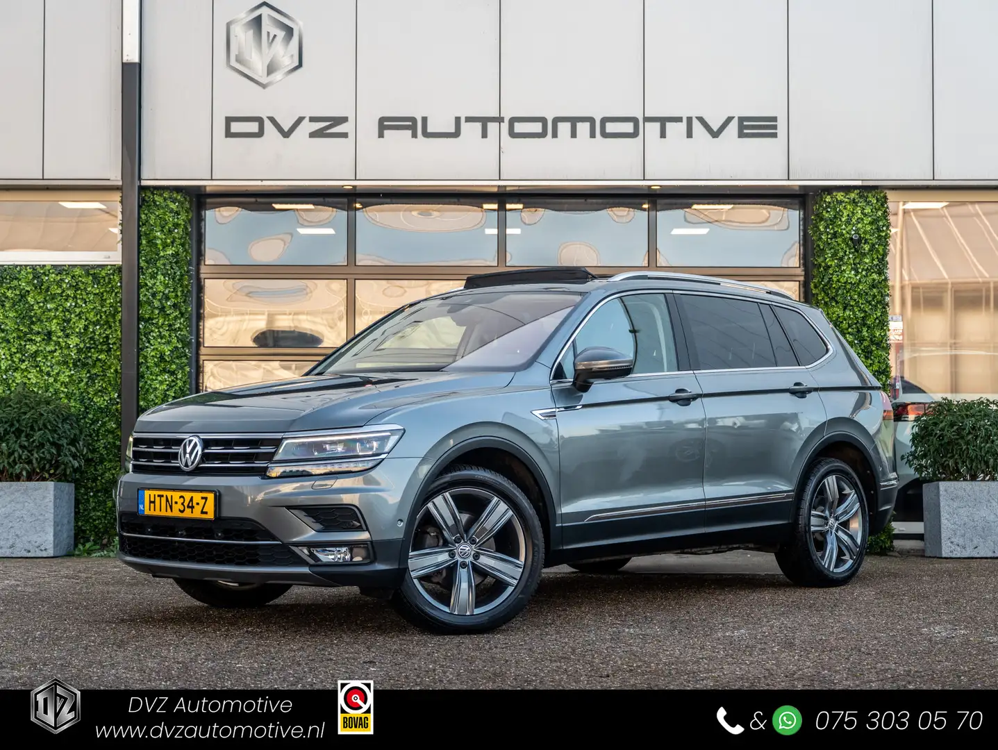 Volkswagen Tiguan Allspace 1.4 TSI DSG Highline | Pano | Leder | Memory | Tre Gris - 1