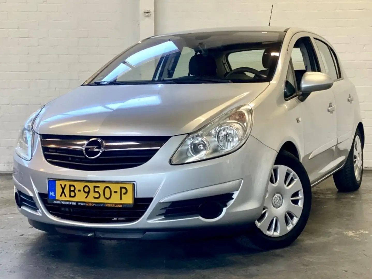 Opel Corsa 1.2-16V Ess |Stuurbkr |CruiseC |Airco |5Deurs Grijs - 1
