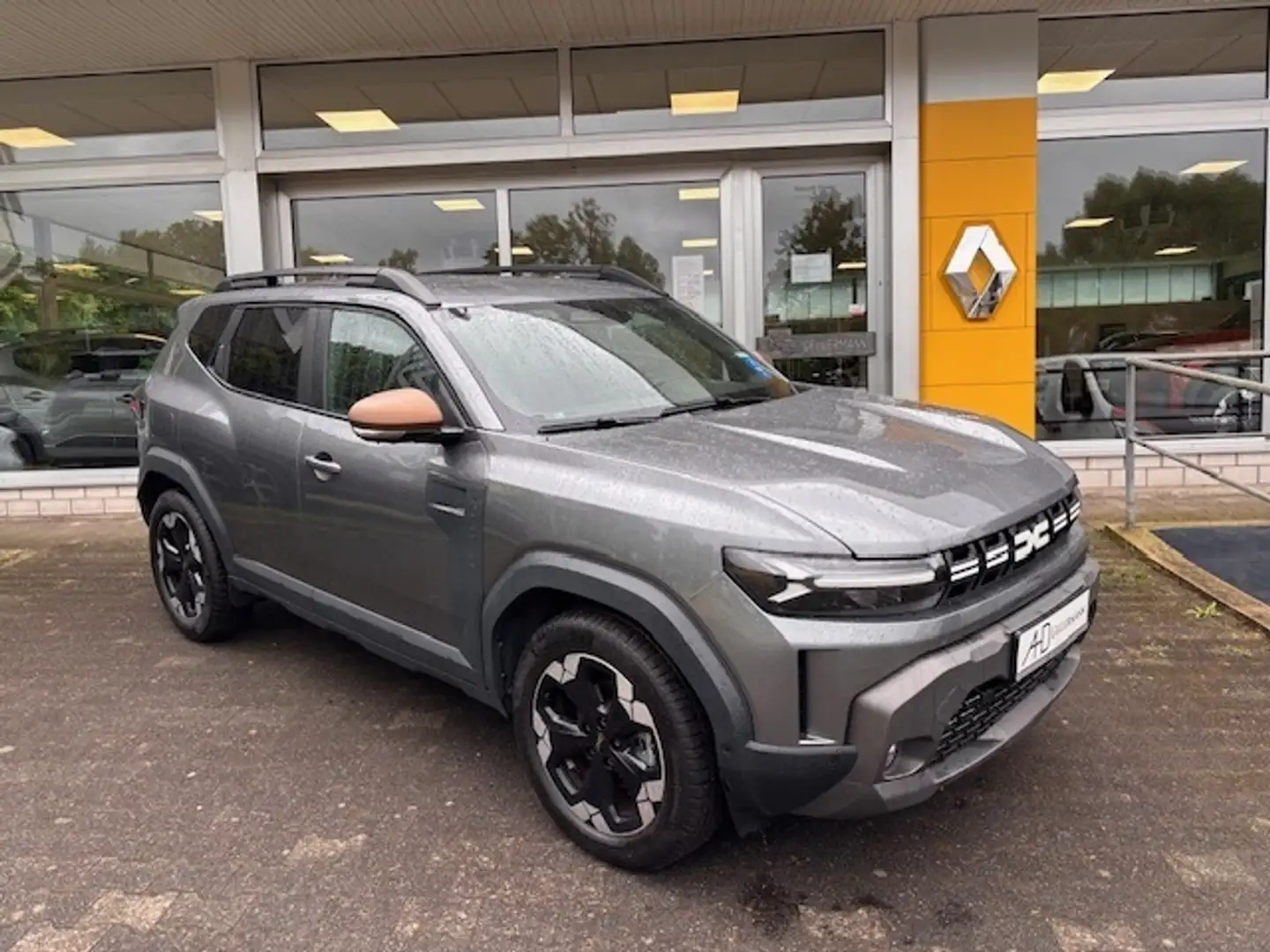 Dacia Duster Extreme HYBRID 140 Automatik Grijs - 1