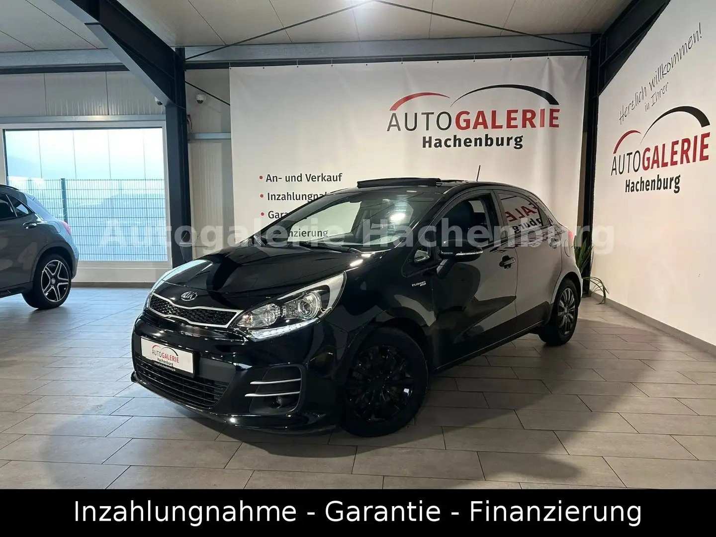 Kia Rio Platinum Edition Aut./Navi/Leder/S-Dach/EU 6 Schwarz - 1
