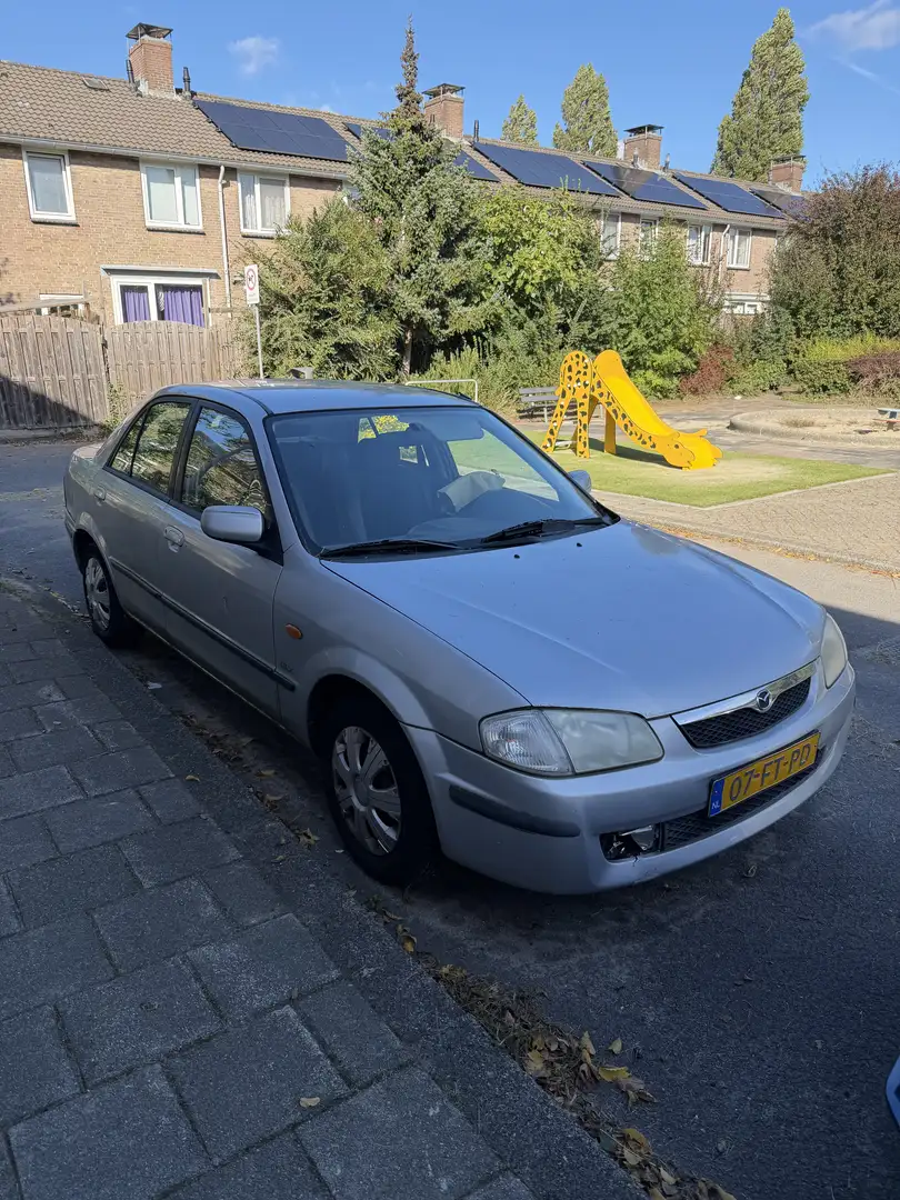 Mazda 323 1.5i LS + Airco Grau - 1