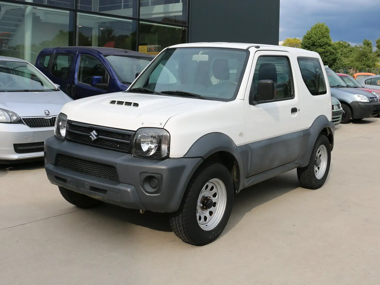 Suzuki Jimny 1.3i JLX 4x4 + 1 jaar garantie Traxio Blanco - 1