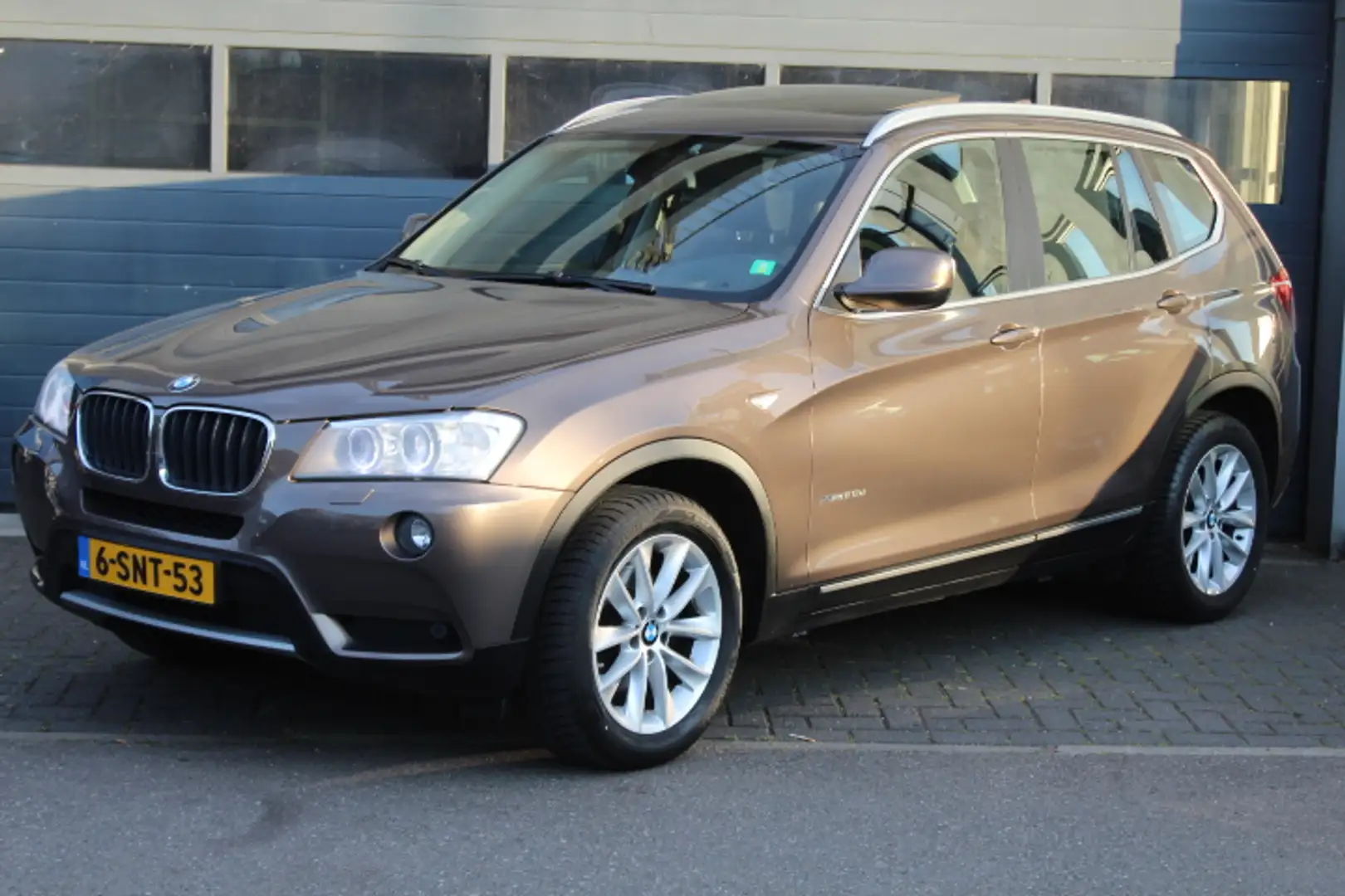 BMW X3 xDrive20d High Executive Aut. Leder, Camera, Clima Bruin - 1