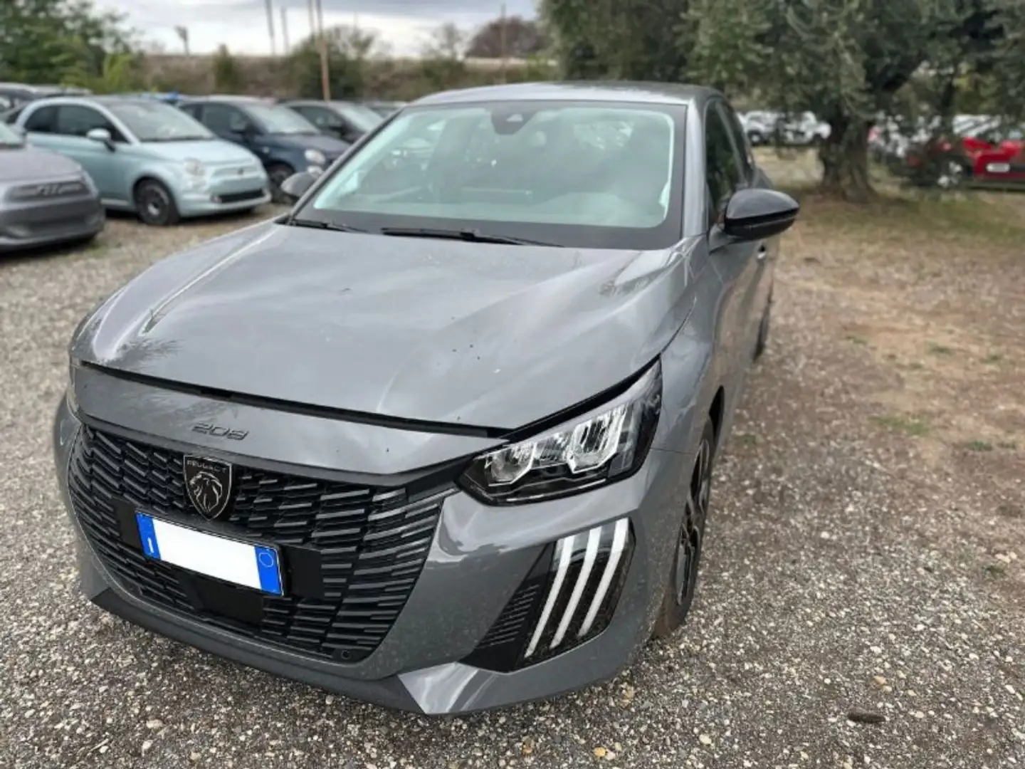 Peugeot 208 1.2 Hybrid 48V Allure Grijs - 1
