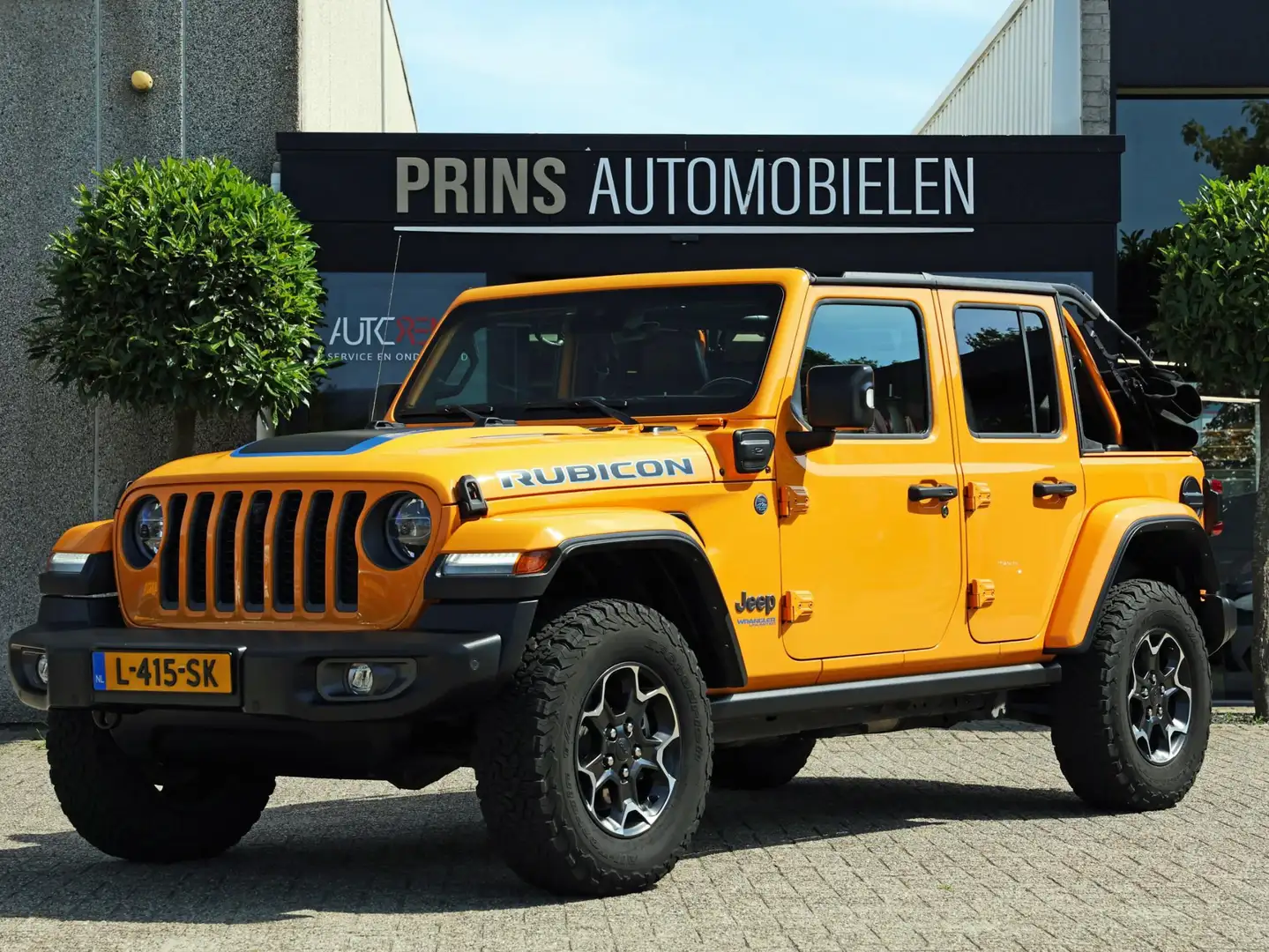 Jeep Wrangler Unlimited 4xe 380 Rubicon Dualtop|Soft+Hardtop Geel - 1