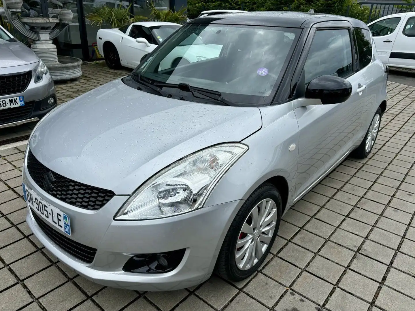Suzuki Swift 1.2i - 16V Gris - 2